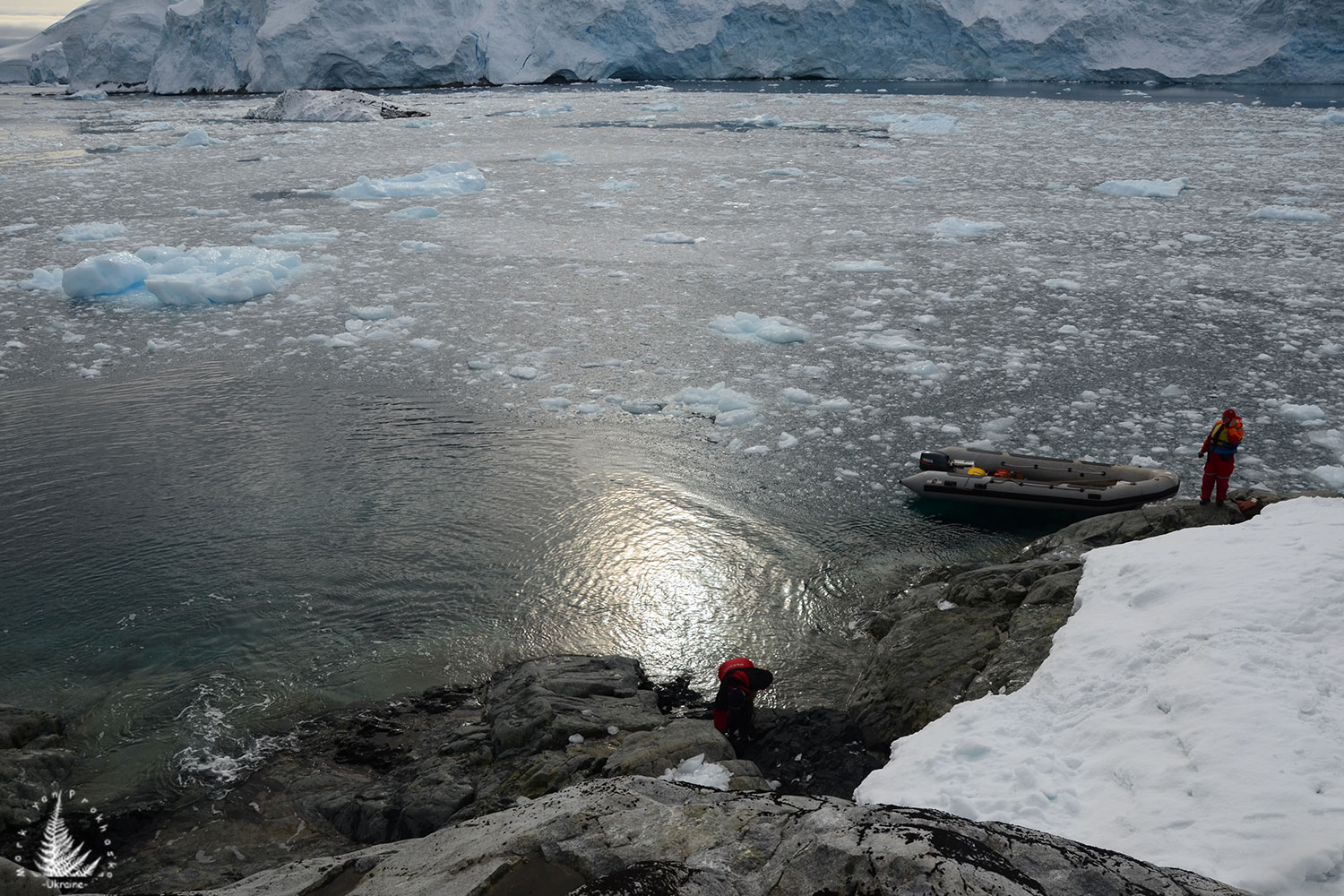 A human amidst ice and the frozen landscape