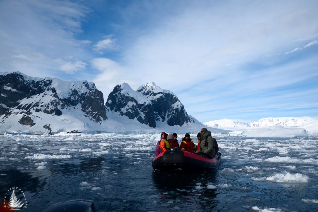 Tiny people amidst immense Antarctica